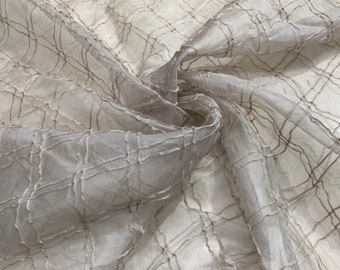 100% Silk organza pintuck 45" wide   Beautiful tan color pintuck organza sold by the yard best use for Appearel & home furnishing
