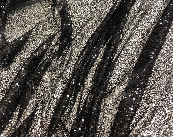 Black sequins on swirl meah fabric 52" wide   Fabric sold by the yard