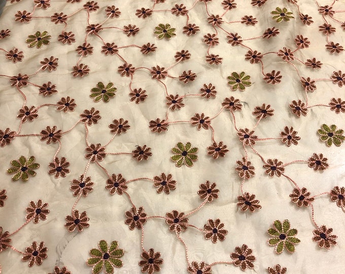 Organza floral embroidery 54" wide        Beautiful beige gold with colorful floral embroidery     Sold by the yard
