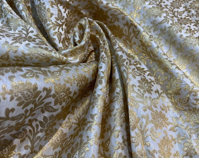Jaquard floral brocade 44" wide   Beautiful Ivory Gold  floral brocade fabric sold by the yard   Useable for apparel and interior decore