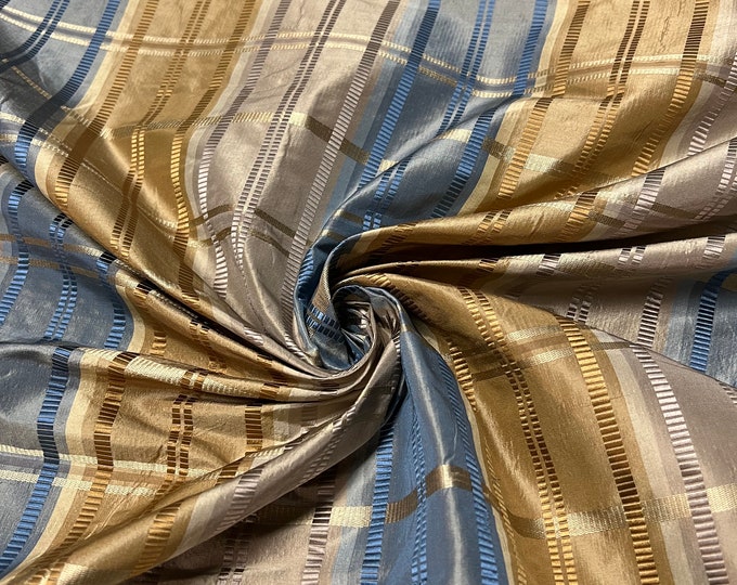 100% silk beautiful beige tan mustard gold with turquoise shades silk satin & ribs taffeta 54" wide            Sold by the yard