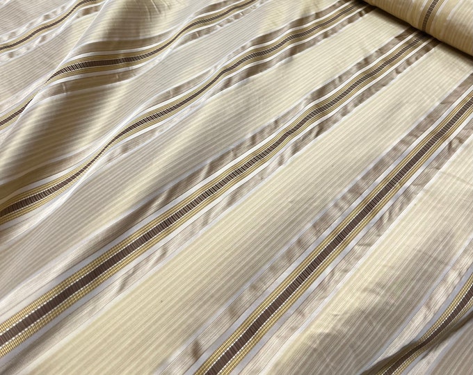 Beautiful Gold base with gold, ivory tan brown shades silk taffeta satin stripes, best used for home decor & apparel.  Sold by the yard