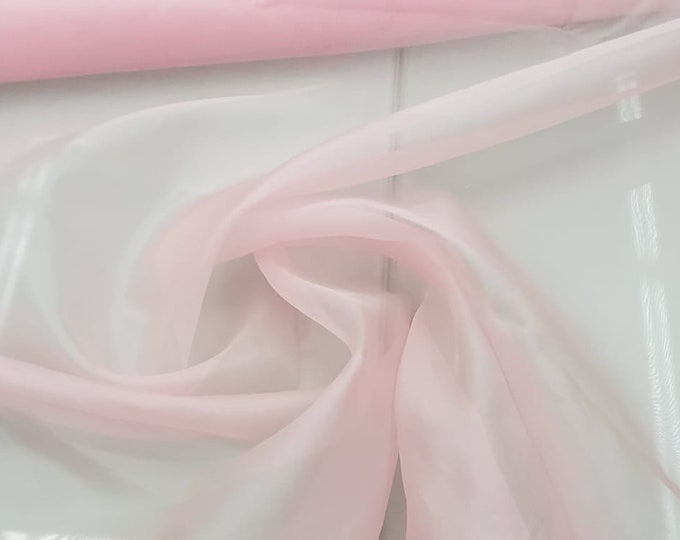 Beautiful baby pink color Irredescent silk organza 54” wide.  Best used for apparel and home Decore. Sold by the yard.