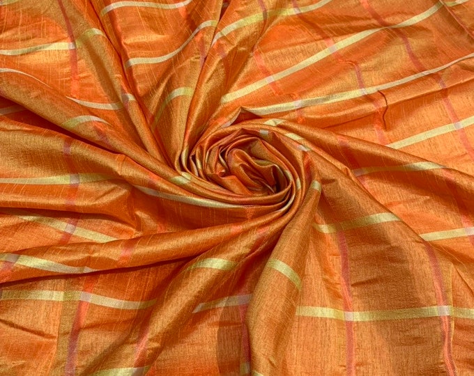 Viscose poly silky crepe check 44" wide    Beautiful orange gold check sold by the yard