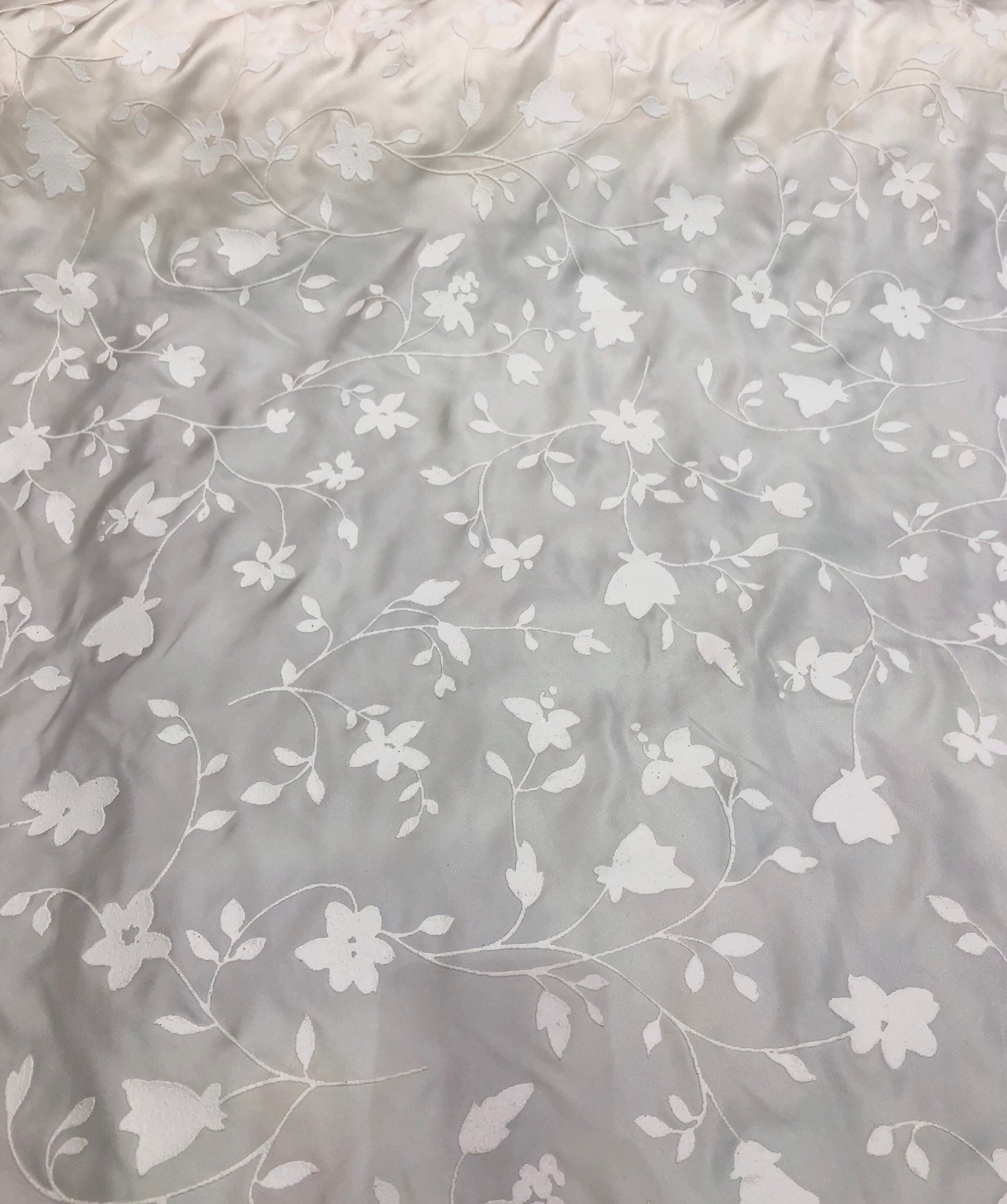 100 silk twill with embosed floral design, beautiful ivory color 60