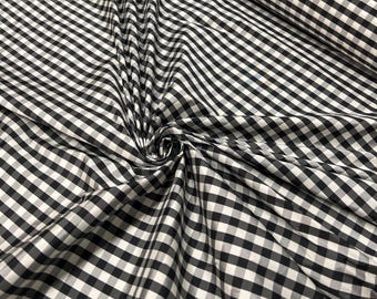 Beautiful taffeta black & white gingham check 54” wide.  Best used for apparel and home Decore.  Sold by the yard