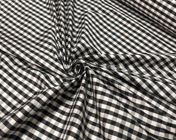 Beautiful taffeta black & white gingham check 54” wide.  Best used for apparel and home Decore.  Sold by the yard