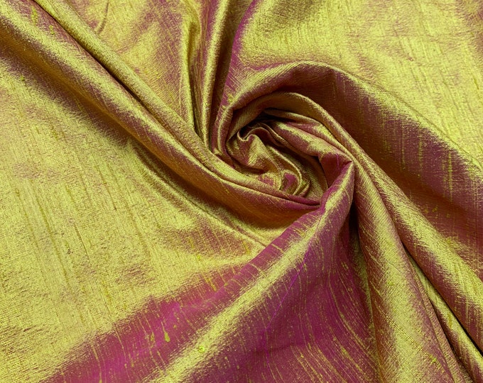 Beautiful yellow gold fusia shantung 45” wide.  Best used for apparel and home Decore. Sold by the yard