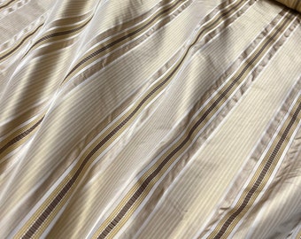 Silk taffeta satin stripe 54" wide     Beautiful different color gold shades satin stripe silk taffeta Fabric sold by the yard