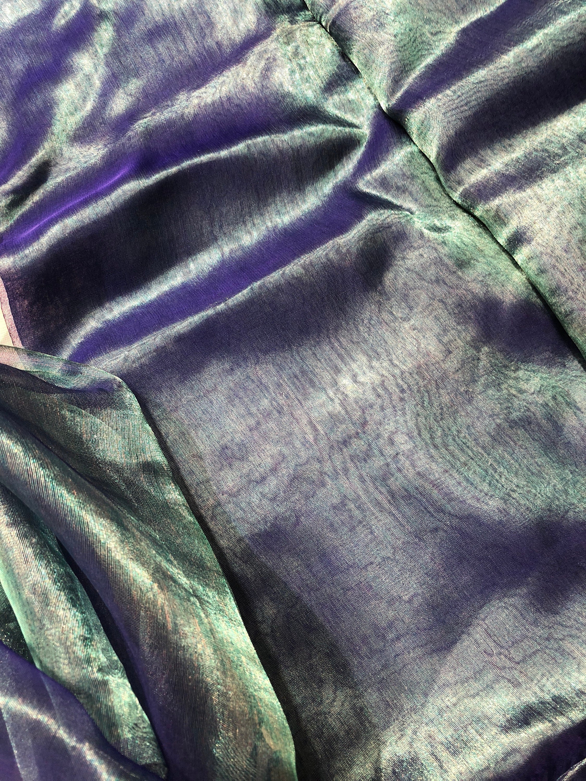 Metallic peacock color 100 silk organza 45 wide usable for apparel Metallic peacock color 100 silk organza 45 wide usable for apparel