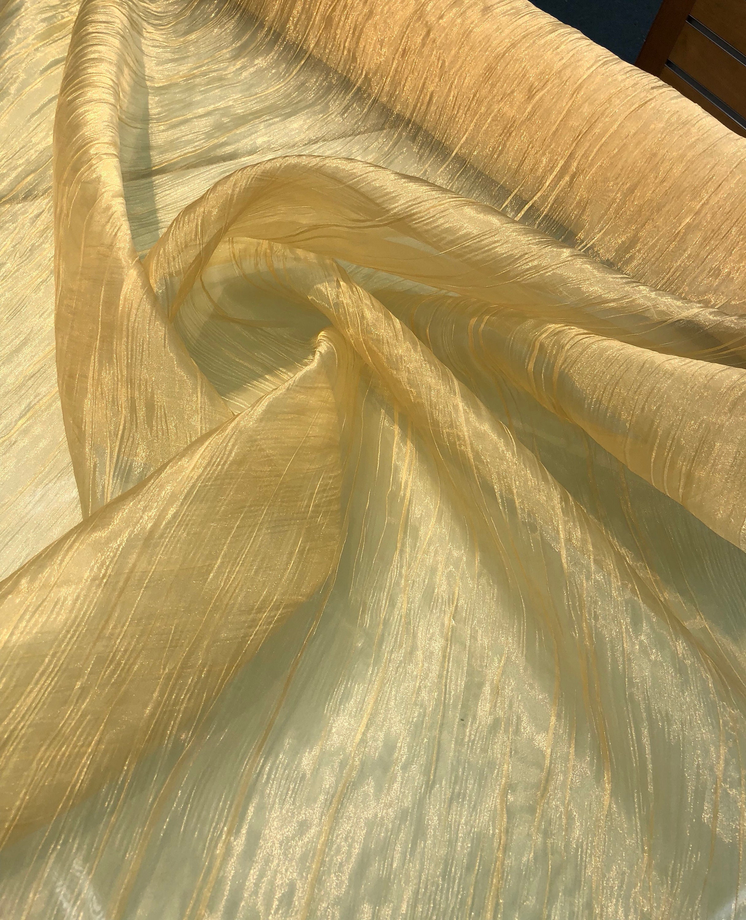 Crinkle organza 45 wide Beautiful gold color fabric sold by the yard