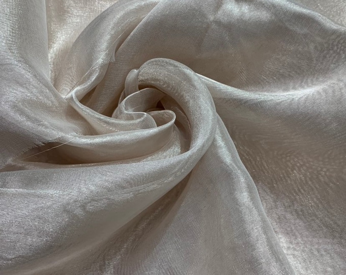 Matalic tissue organza 44" wide   Beautiful ivory color sold by the yard   Best if used for appreal & home decor