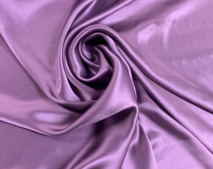 Beautiful purple color silk Charmouse 54” wide.  Best used for apparel. Sold by the yard