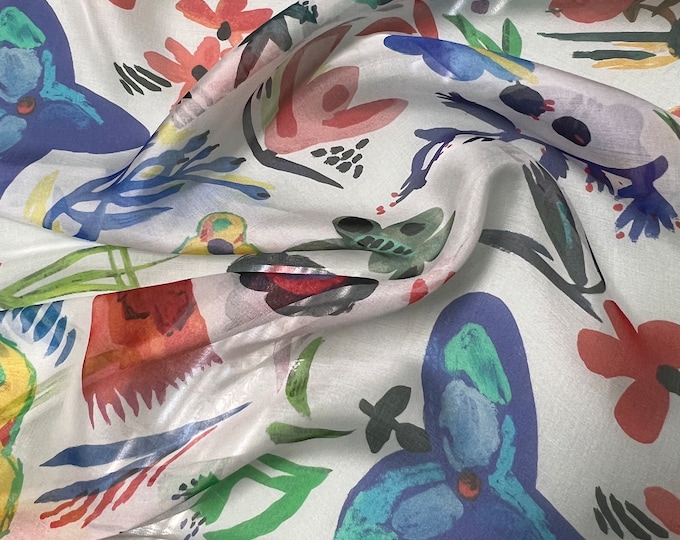 100% silk satin face chiffon digital print 54" wide    Beautiful ivory base blue red yellow abstract floral design 54” wide
