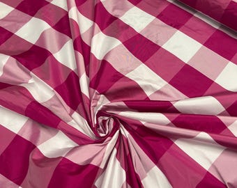 Beautiful Bright Fusia and white taffeta plaids 54” wide.  Best used for home decor and appreal.  Sold by the yard