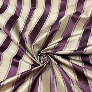 100% silk beautiful beige light gold with bright purple silk satin stripes.  silk satin taffeta 54&quot; wide            Sold by the yard