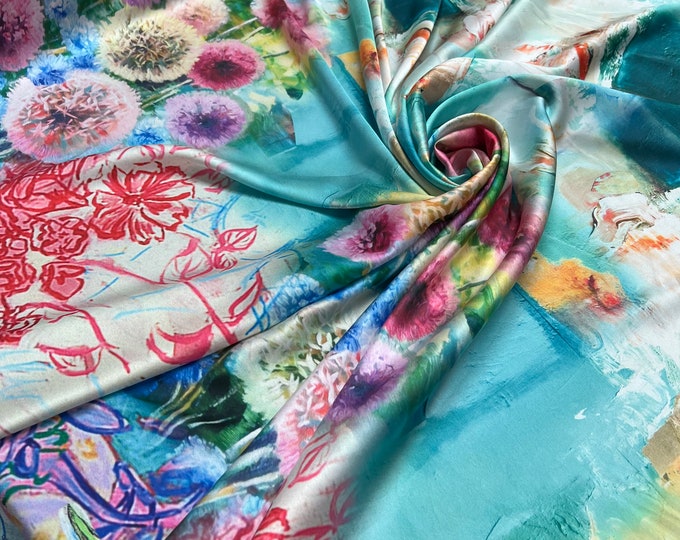 Beautiful multi color floral design border style designer digital print on silky satin 54” wide. Sold by the yard. Best used for apparel