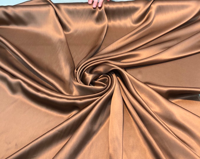 Silk charmouse 54" wide    Beautiful copper gold silk satin charmouse fabric sold by the yard