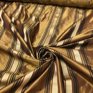 Silk taffeta 54" wide   Beautiful copper gold with black and gold ribbing stripe silk taffeta fabric sold by the yard