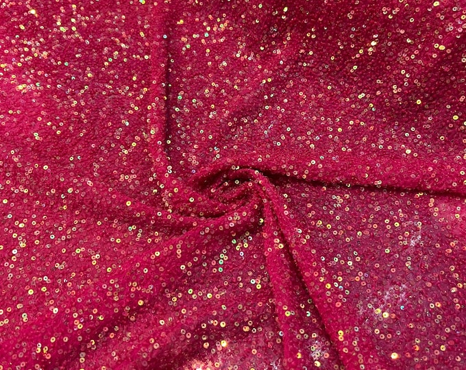 Beautiful Fusia on Fusia tiny florescent sequin hand embroidered on silk chiffon 45” wide. Best use for apparel