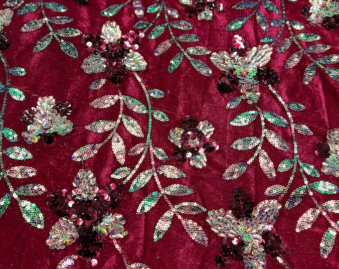 Velvet with sequence embroidered 45" wide   Beautiful red velvet with floral leaves sequence pinkish red wine. sold by the yard