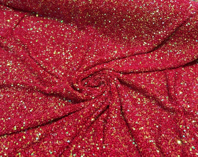 Beautiful bright red color tiny florescent sequin hand embroidered on silk chiffon 45” wide. Best use for apparel