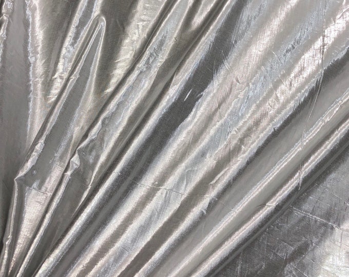 Silver color Matalic cotton fabric 44" wide   Beautiful silver color matalic cotton fabric sold by the yard