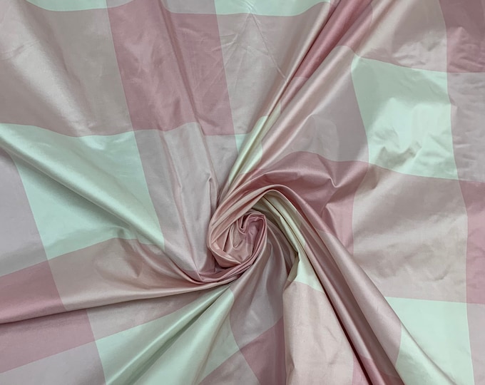 Beautiful baby pink and white 100% silk taffeta 54” wide.  Best used for home decor and apparel.  Sold by the yard
