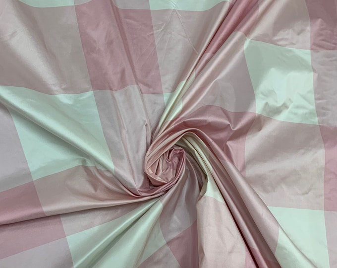 Beautiful baby pink and white 100% silk taffeta 54” wide.  Best used for home decor and apparel.  Sold by the yard