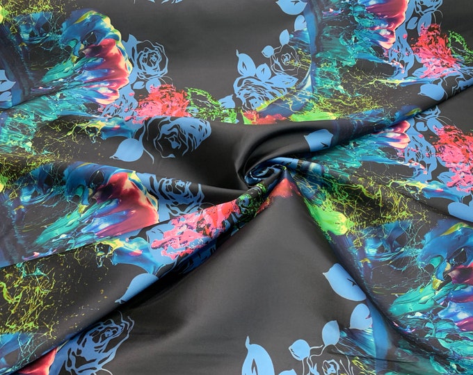Mikado Zibelline printed fabric 54” wide.  Beautiful black navy base blue floral print beat used for apparel. Sold by the yard