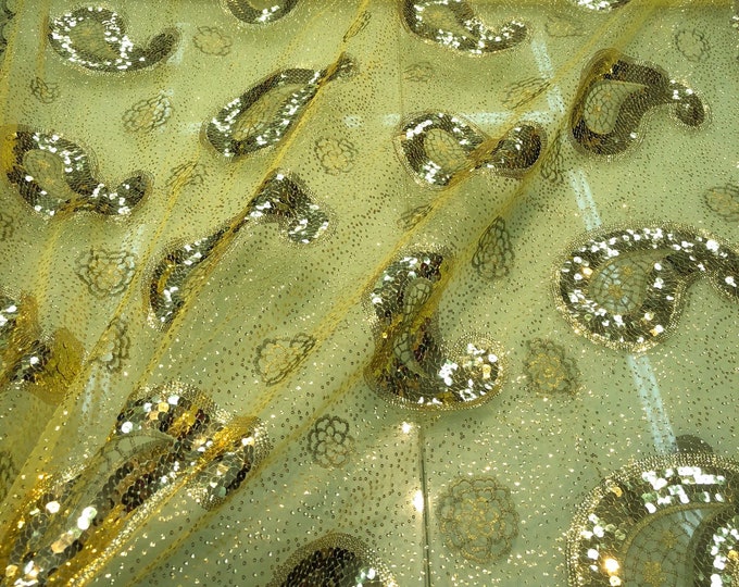 Sequins allover paisley design 54" wide   Beautiful gold paisley design sequins on net fabric sold by the yard