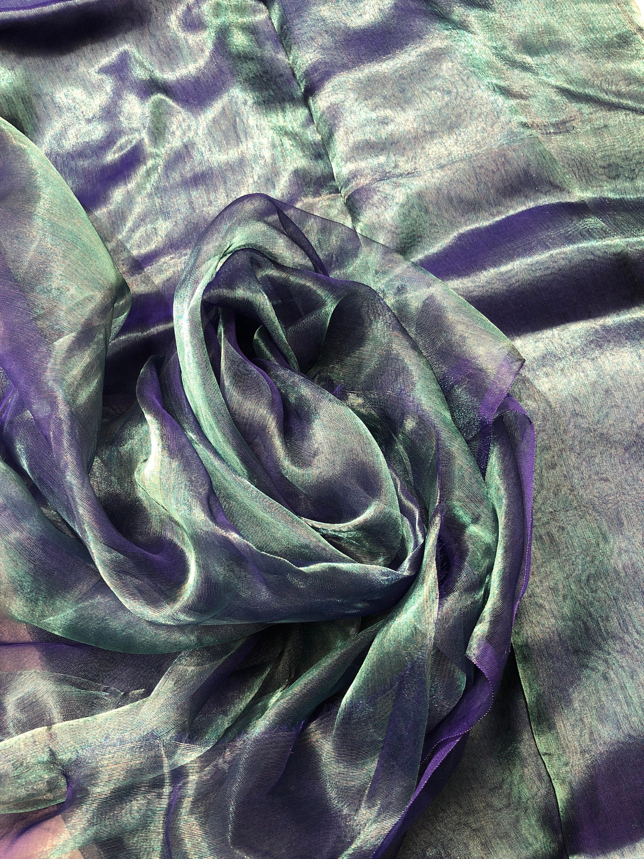 Metallic peacock color 100 silk organza 45 wide usable for apparel Metallic peacock color 100 silk organza 45 wide usable for apparel