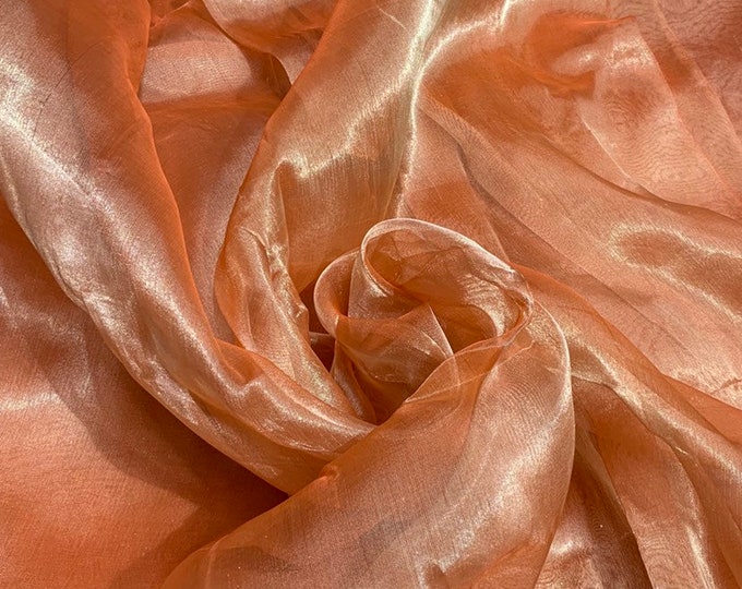 Matalic tissue organza 45" wide   Beautiful matalic orange color sold by the yard   Best use for appreal & home decor