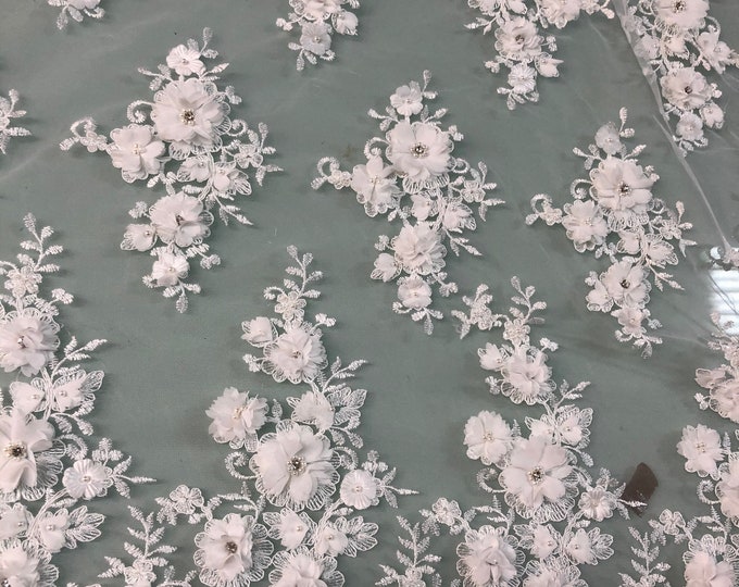 Hand beaded floral design with 3D flowers white lace on meah fabric sold by the yard