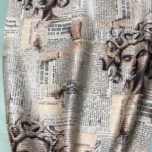 Soft Satin charmeuse digital print 54" wide   Beautiful beige gray news paper with face print design   Fabric sold by the yard