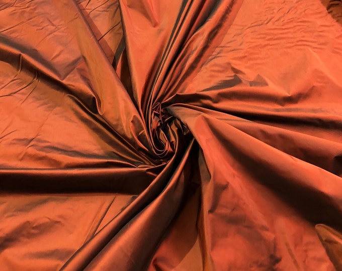 Silk taffeta 54" wide    Beautiful burnt orange color silk taffeta fabric sold by the yard