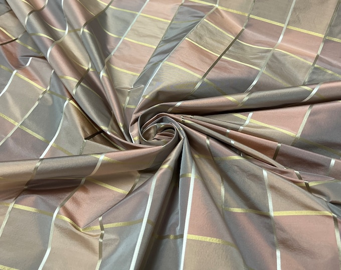 100% silk beautiful gray mauve pinkish gold with gold satin stripe plaids .  silk taffeta 54" wide            Sold by the yard