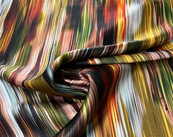 100% silk satin charmeuse digital print 54" wide    Beautiful dark shades striped yellow burnt orange blackish design soft fabric 54” wide