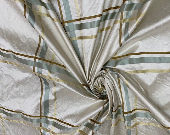 Beautiful beige Shantung with aqua gold satin checked silk shantung fabric 54” wide.  Best used for home decor. sold by the yard