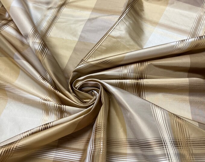 100% silk beautiful beige tan canary yellow ivory with gold satin stripe plaids .  silk taffeta 54" wide            Sold by the yard