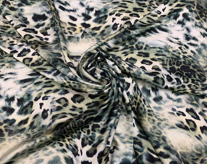 Digital satin Charmouse print 54” wide.  Beautiful greenish color leopard animal print beat used for apparel. Sold by the yard
