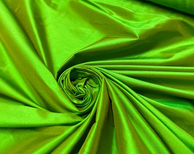 Silk shantung 54" wide   Beautiful bright green copper cross iridescent silk shantung fabric sold by the yard