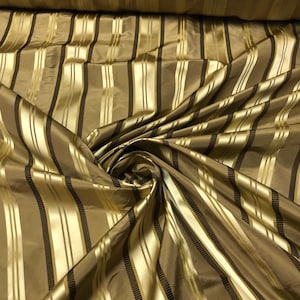 Silk taffeta 54"   Beautiful bronze brownish with gold satin stripes fabric sold by the yard