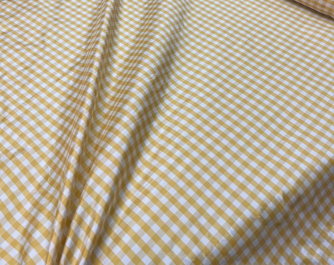 Beautiful taffeta Bright Yellow & white gingham check 54” wide.  Best used for apparel and home Decore.  Sold by the yard