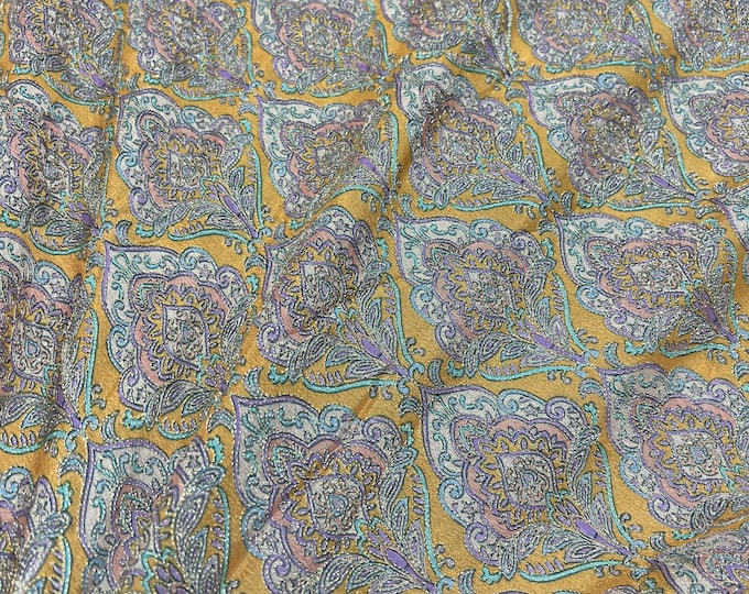 Beautiful soft yellow with champagne purple pink silvers emb 46”wide    Beautiful artistic design embroidered viscose soft chiffon.