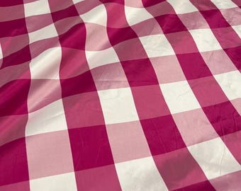 Beautiful Fusia and white taffeta plaids 54” wide.  Best used for home decor and appreal.  Sold by the yard