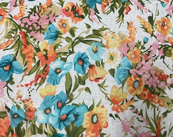100% Linen designer print, Ivory base with orange pink turquoise green yellow allover floral  printed linen. 58” wide Sold by the yard