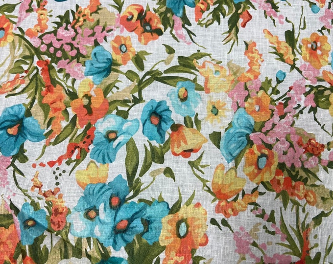 100% Linen designer print, Ivory base with orange pink turquoise green yellow allover floral  printed linen. 58” wide Sold by the yard