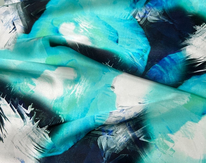 100% silk satin charmeuse digital print 54" wide    Beautiful white Aqua navy blue silver shades abdstract design soft fabric 54” wide