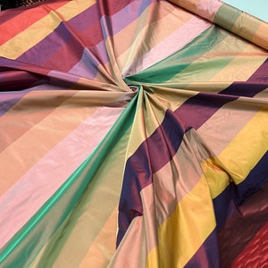 100% silk taffeta stripe 54&quot; wide                      Sold by the yard          Beautiful multi color rainbow shades silk taffeta stripes